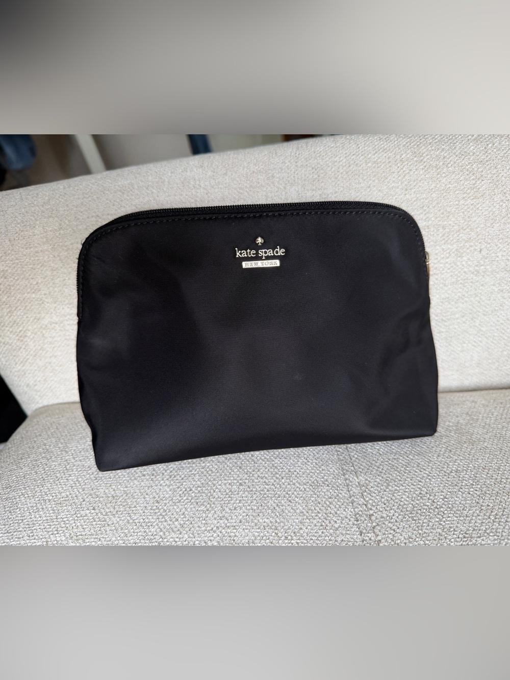 kate spade black nylon cosmetic pouch with gold logo